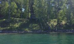 Large lot with private setting on beautiful bad medicine lake; the lake of sky blue waters!