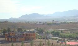 2.5 acres up in the hills overlooking Las Vegas and the Strip off of Lake Mead towards Lake Las Vegas. Surrounded by 1+ acre homes. Even if you build a one story home you will have great views with this lot. You can even build two dream homes with views