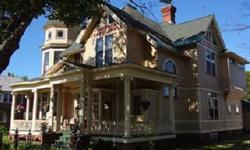 Inspiring Victorian built in 1903 by Lumber Baron, Charles Byrns, as a showpiece for his woodworking skills, which are throughout the home. Cherry, oak, pine and birch woodwork highlight the home and beautifully accompany the pine hardwood floors on the