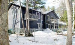 Lake Arrowhead, year-round lakefront home is sited on a double lot with 400+/- water frontage offering scenic water views and a deepwater dock. Spacious 3 BR, with lots of living space for entertaining, cathedral ceilings, 2 woodstoves, two large