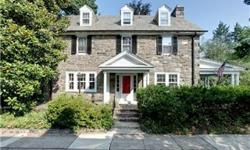 Old world charm t/o beautifully maintained 3 story stone colonial. Meticulously landscaped, fenced in lot. Enter the stunning center hall leading to formal LR w/ custom built in shelving, gas FP w/ mantle, & double French doors leading to covered porch,