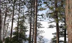 Excellent building site on Lac Courte Oreilles Lake. Set on the South side of the lake, enjoy beautiful northern big water views and peaceful sunsets. Lot is a private 3.13 acres of wooded land with a great view of the lake. There is over 150 feet of