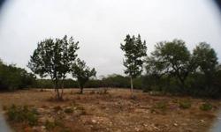 This fabulous lot is one of the largest lots available in the Flying L Ranch. 0.721 acres overlooking San Julian Creek and green belt area. Extraordinary views and seclusion in this quiet hill country golf community. Come and build your dream home. Many