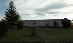 Manufactured home on 2 city lots. Manufactured home needs some TLC, cannot be financed due to age.
Listing originally posted at http