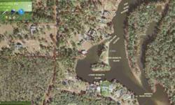 What do you want to do today. Kick back, relax watch the boats go by, go fishing...Welcome to 16676 Keeney Drive East in Fairhope on Fish River where you can do it all and more. This incredible lot has 107 feet of water frontage and sits on a cove off the