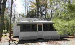 Situated on .34 beautifully wooded acres this home features 2 bedrooms, with full bath, Living Room and Dining Room combination with alcove, Enclosed Front porch and 1 car detached garage. WHY RENT WHEN YOU CAN OWN THIS HOME AT A LOWER COST THAN A