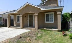 Remodeled in 2010, this 3 bedroom 3 bath home includes two master suites with their own separate entrances, living and dining area, separate laundry room, laminate wood flooring, central air, cooper piping and a newer roof. Home is walking distance to