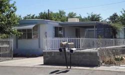 Nice Manufactured Home in Deming Estates a 55+ Community. 2 Bedroom 1 bath. 24 hour volunteer patrol and $45 Annual HOA Fee. Carefree Desert Landscaping. Some furniture stays, Bed, Sofa and Chair.Listing originally posted at http