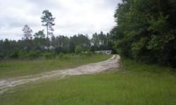 Almost 7 acres . Enough space to have horses. MH home is selling as is and the value here is the acerage. There are no deed restrictions or HOA in rural areas. Just clear skies, peace and quiet. About 20 miles to shopping and hospital so you have a little