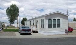 Super clean well maintained mobile home located in Garcia Mobile Home Park. 3 bedrooms, 2 bathrooms, large front sunken kitchen!!! Landscaped yard. Lot rent is $260 which includes sewer and trash. Maximum of 2 pets are allowed with Park Manager approval.