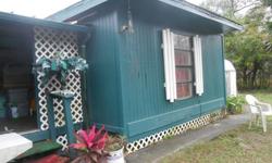 This is a cute trailer on a large lot with very reasonable lot rent. Backs up to the woods and has a privacy fence and the land lady does not mind if you have dogs. It needs some work, but that is what you would expect for the price. There are a lot of