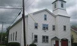 Had been a church with newer exterior, some remodeling. Many possiblities with proper zoning (Residence, antiques, gallery, B&B, etc.) Great old bell tower! Just think of all the things you can do with this much space. The upper Master Bedroom has a huge