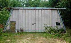 This 40x54 butler building situated on over two acres offers 20' overhead doors that open both front and back. Listing originally posted at http