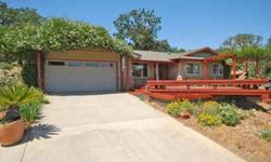 This lovingly maintained, updated home is located in Atascadero, the jewel of California's central coast. Experience a slice of heaven on earth at this sustainable property known as the "Happy Karma Farm." The home has been completely renovated and