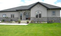 Custom Built 2 Year Old Bungalow Located in Desirable Waters Edge Community. Main Floor Feat
