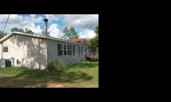 This is a steal., Brand new fencing around the property., over an acre of land houses this huge Manufactured home with stick built addition on the back that houses bedroom, bathroom and would be kitchen., Large laundry room off the kitchen., Could be a