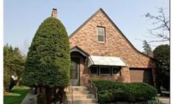 Amazing all brick Tudor built in 1935 that is in move in condition. This 4 bedroom two story boasts a sunroom, a full basement with a family room and huge utility/storage area plus a one car garage and very private backyard. We have gorgeous hardwood