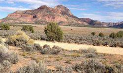 Large 1.98 Acre Lot In Apple Valley Ranch SubdivisionLot Goes From Golden Delicious To Rome WayYou Can Build Your Home On Either StreetFantastic Lot With Incredible Views In All DirectionsWhich Include Zion National Park, Smithsonian Butte, And Pine