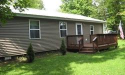 Extreme Makeover- This 1982 manufactured home has been completely renovated in 2005! New walls, drywall, floors, electrical, just name it and it`s been done! The appliances all convey and are like new. This ranch home is surrounded by trees and