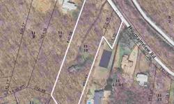 Possible sub division, property zoned R65 with a 1.5 acre min. Colonial home on property built in 1980. Parcel offers public water, sewer and gas hookups in the street. No wetlands known.Listing originally posted at http