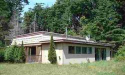 RUSTIC 1448 sq ft home on WOODED ACRE. QUIET COUNTRY LOCATION. Cash or FHA 203k loan. Foundation