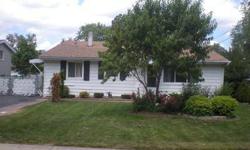 Three bedroom home in Carpentersville with two full baths. The living area consists of the living room and the open kitchen with oak cabinetry. Three bedrooms are on the upper level. Two car detached garage. This property is eligible for Freddie Mac First