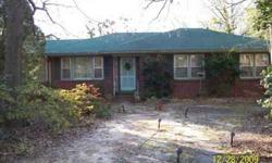 Brick home located in a good neighborhood about mile from town. There are 3 bedrooms, living room, kitchen/dining room, large sun room, and full basement. Dishwasher, hard wood and carpet flooring, central heating and AC. $89,900. Finley Realtor