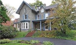 One of Chestnut Hill~~~s earliest houses-- a grand, old Gothic Revival from 1862-- offers today~~~s buyers the decided pleasure of a well updated six bedroom, three and one-half bath home with newer kitchen (2005) newer heater (2005), new hot water heater