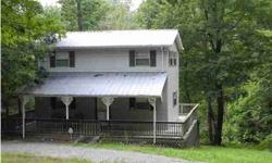 $88,500. Looking for a place to get away from it all? This mountain hideaway is perfect for that. Covered front porch that wraps around entire home is a great place to relax. Cozy living room opens to a beautiful kitchen featuring stainless steel
