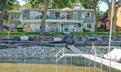 Enjoy the ultimate lifestyle in this beautiful lakefront home layed out for plenty of family & guests. Large eat in kitchen on main level plus formal dining room with lake view. Great room with fireplace & southern exposure offering exceptional view