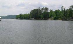 BEAUTIFUL WOODED LAKE LOT WITH TERRIFIC BUILDING SITE. HAS GREAT VIEW OF SMITH LAKE, HAS ROCKY TERRAIN & SHORELINE. PRE-APPROVED FOR DOUBLE SLIP BOAT DOCK WITH 60 FT WALKWAY,SELLER SAYS LOT HAS YEAR ROUND WATER. LOCATED ON MAIN CHANNEL OF RYAN CREEK AND