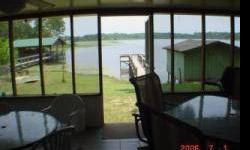 Beautiful Sunrise on Lake Seminole! Awesome Views!! Water Sports! Fishing! Duck Hunting! Photos show the A-Frame before the fire damage which was cosmetic and is still "open" for you to evaluate. You can remodel the 2 bedroom, 1 bathroom, plus a large