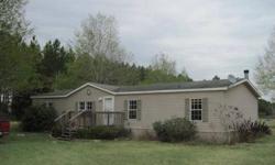 Don't miss this opportunity. Paved road, almost completely fenced 3 acre parcel with this well maintained "family size" Doublewide manufactured home. Over 1,700 square feet of living area with 3 bedrooms, 2 baths and great open floor plan. Light and