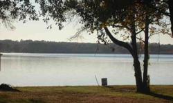 LAKE PALESTINE WATERFRONT LOT ON GREAT WATER! West facing fantastic lot on a great peninsula of Lake Palestine. Half acre buildable lot with almost an acre of River Authority property. Concrete seawall. Aerobic septic system sketched out, 2500 square