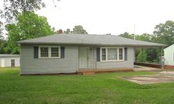 This vinyl sided home has 3 bedrooms and 1 bath.It features a formal living room, dine-in kitchen, laundry area, enclosed patio, some hardwood flooring, and single-car carport. It also has a 20' x 25' detached utility building with electricity, gas and
