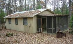 Perfect opportunity to own your own hunters cabin and retreat. located in a wooded setting with hunting outside your door. Priced to move and ready to convey, this cabin begs to be the center of an incredible hunting season ahead. Furnished and ready to