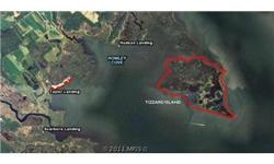 Once in a lifetime opportunity to own your own island in the Chincoteaque Bay. Tizzard Island has been a privately owned gun and hunting retreat since 1938. Approx. 250 ac with very rustic lodge house, separate boat house, ramp landing. There are no